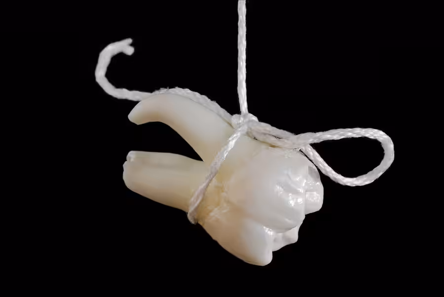 Tooth extracting method